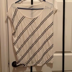 White and black short sleeve shirt